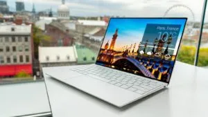 laptop on white table