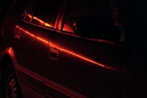 red car with black and red lights